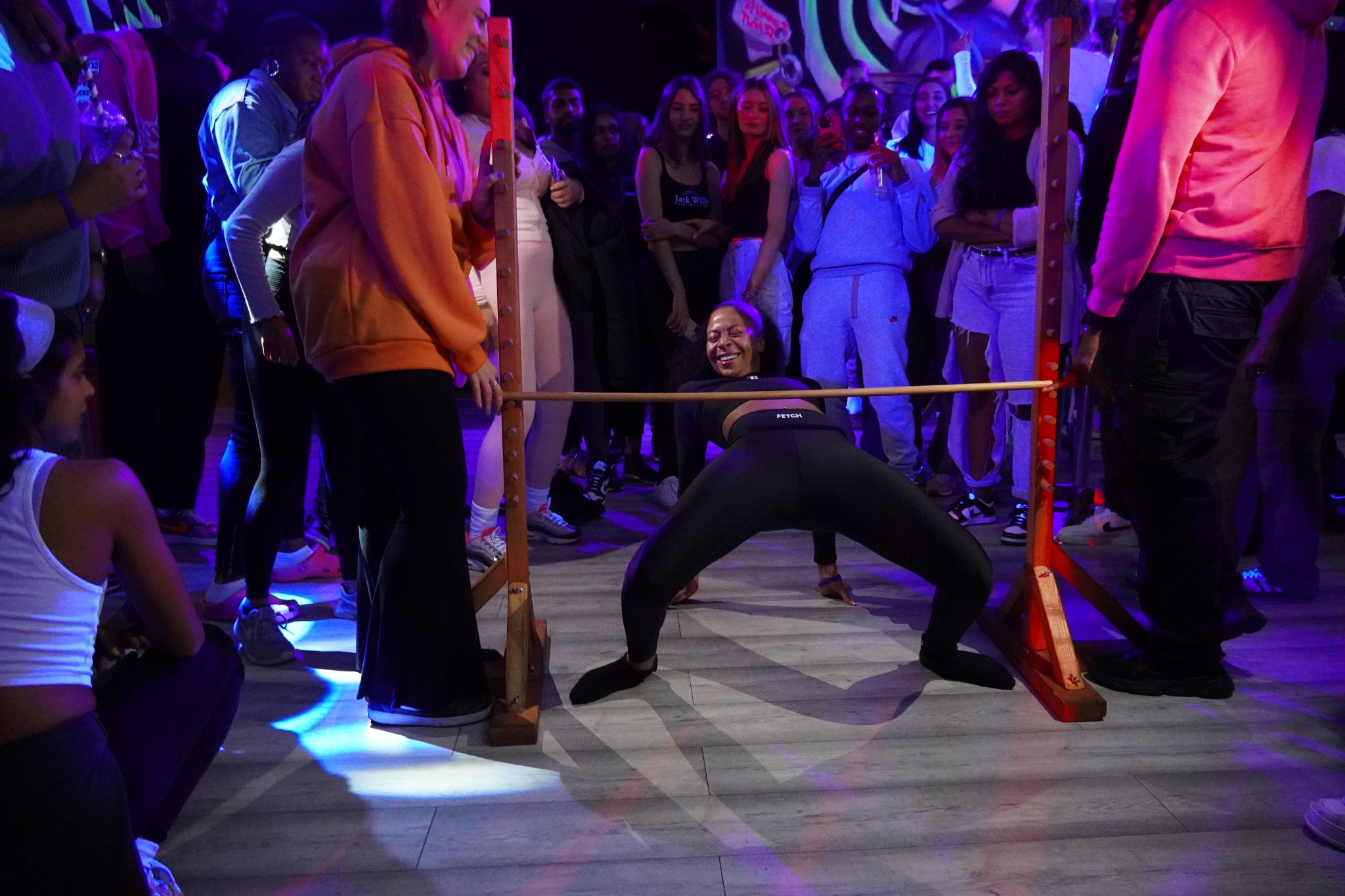 Guests playing limbo at DJW Events