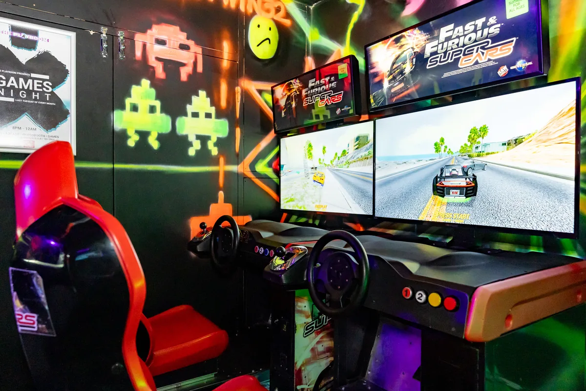 Driving arcade game at DJW Events