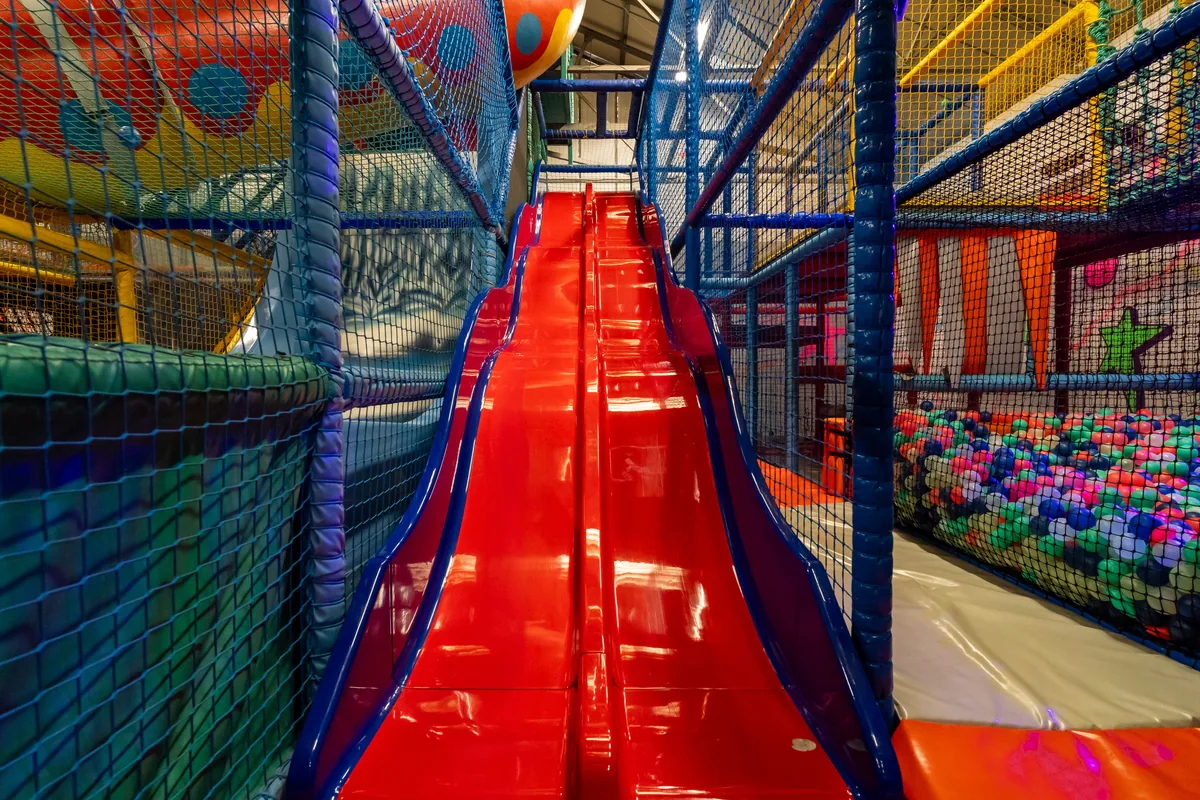 Red slide inside DJW Events